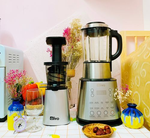 review máy ép chậm olivo sj 210